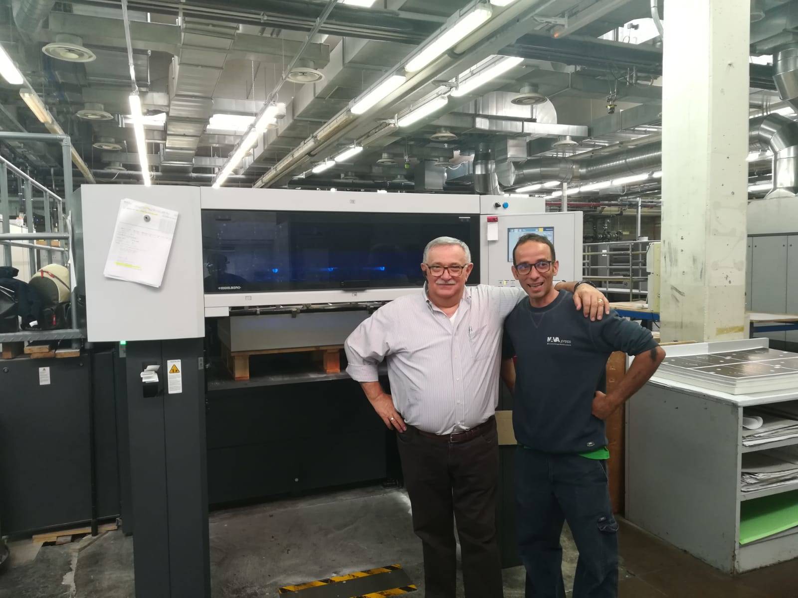 M. Cavicchioli Production Manager Nava Press Milan with printer